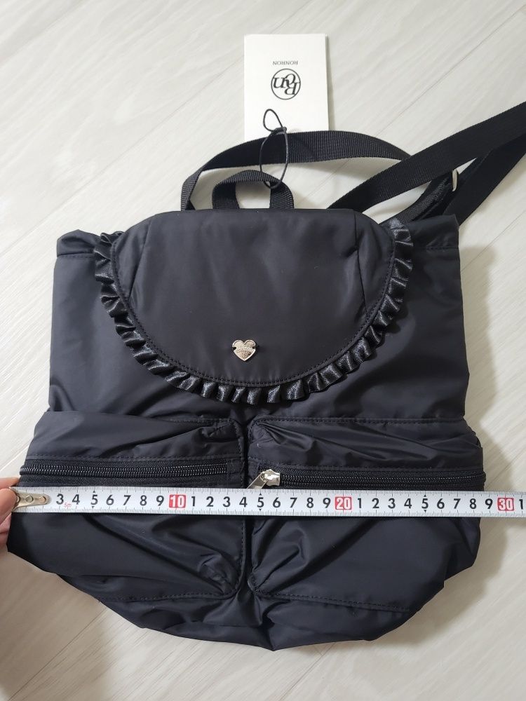 MUSINSA | RONRON RUFFLE POINTED MINI BACKPACK SILVER