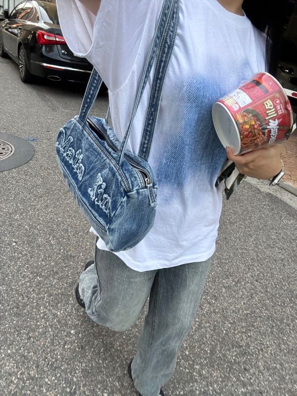 MUSINSA | MATIN KIM LOGO WASHED DENIM DUFFEL BAG IN BLUE
