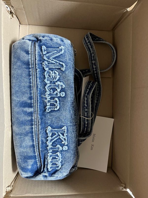●Matin Kim●LOGO WASHED DENIM DUFFEL BAG IN BLUE MUSINSA | MATIN KIM LOGO WASHED DENIM DUFFEL BAG IN BLUE