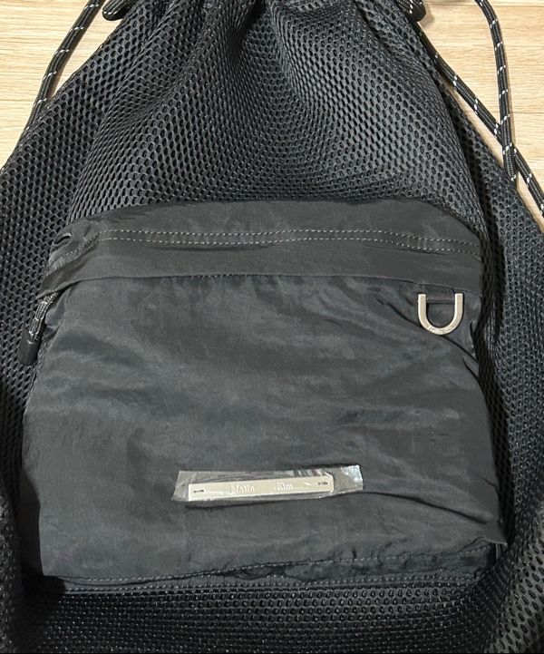 MUSINSA | MATIN KIM CARGO MESH BACK PACK IN GREY