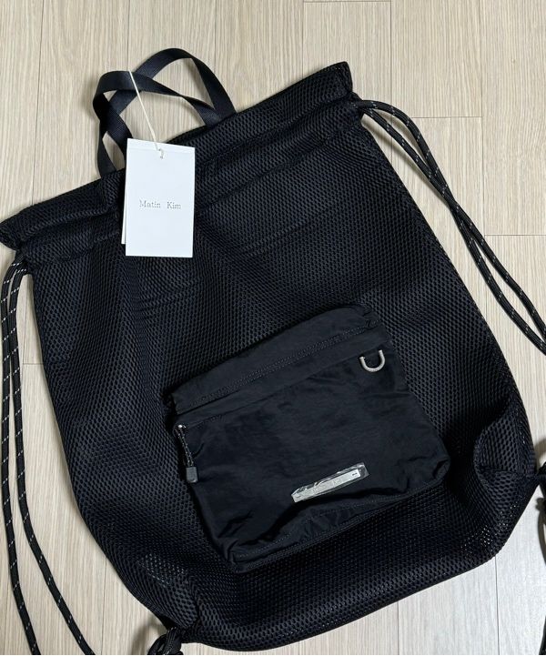 MUSINSA | MATIN KIM CARGO MESH BACK PACK IN GREY