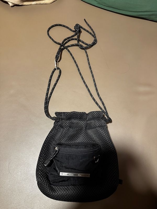 MUSINSA | MATIN KIM CARGO MESH CROSS BAG IN BLACK