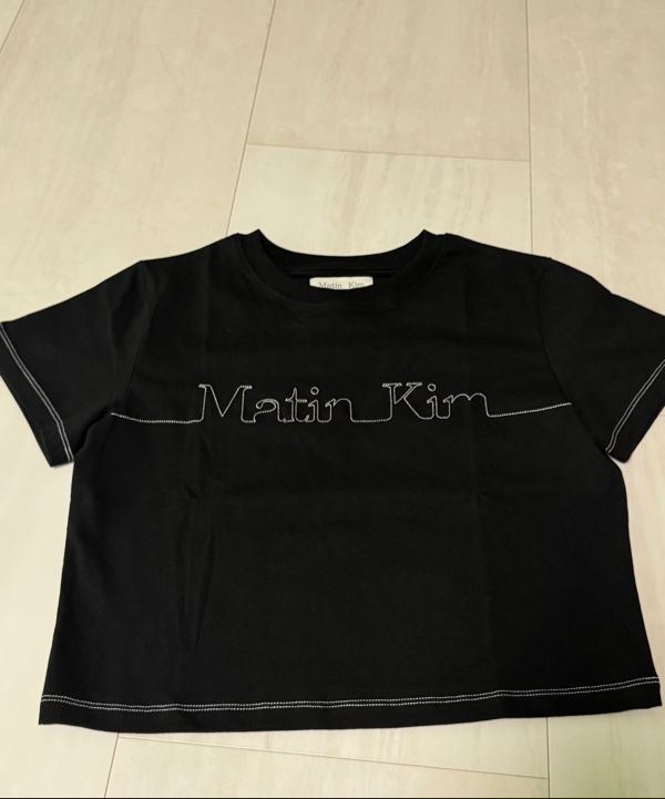 MUSINSA | MATIN KIM MATIN EDGE STITCH LOGO CROP TOP IN CHARCOAL