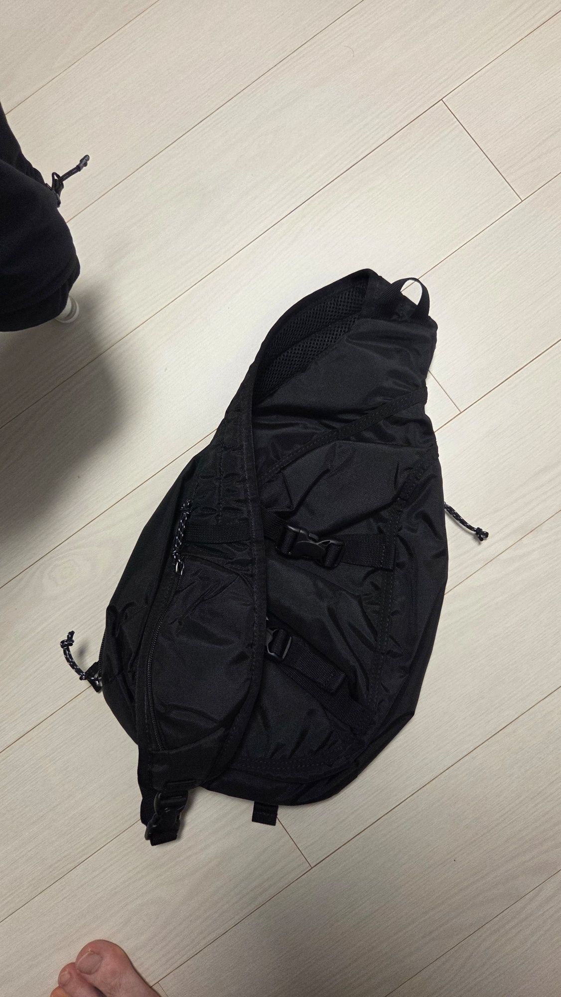 MUSINSA公式 | thisisneverthat Washed Nylon Sling Bag Black