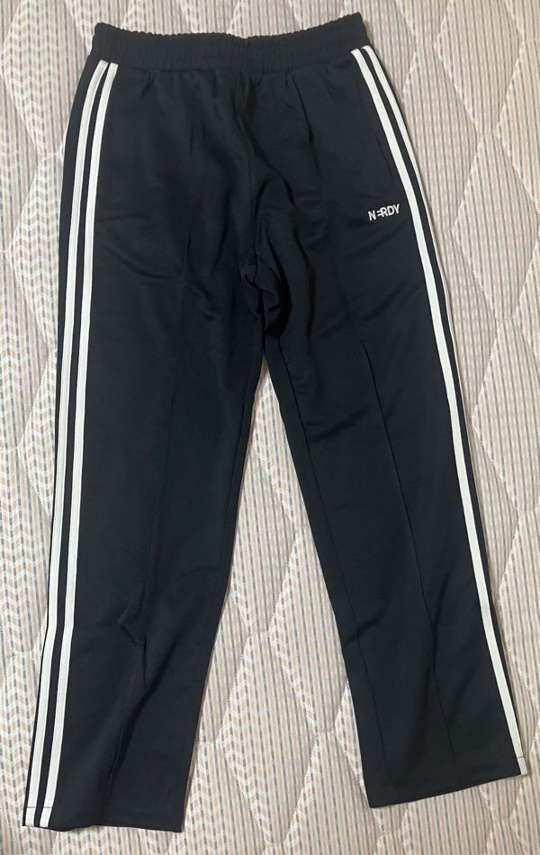MUSINSA | NERDY Classic NY Track Pants (Black/Dark Green