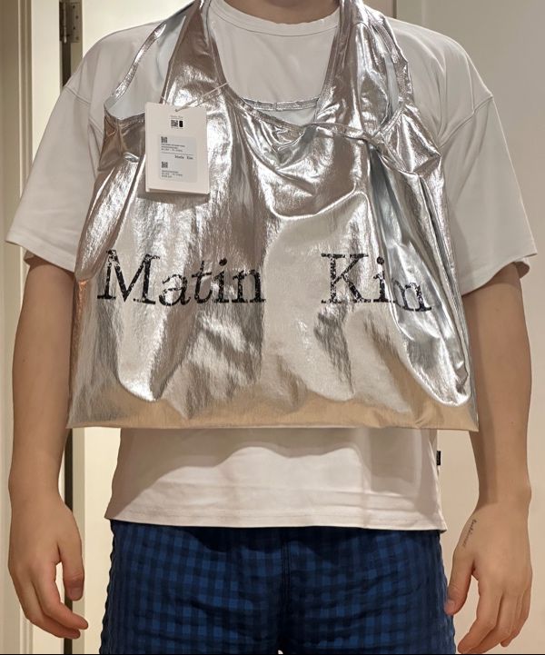 MUSINSA | MATIN KIM MATIN CRACKED LOGO GLOSSY ECOBAG IN SILVER