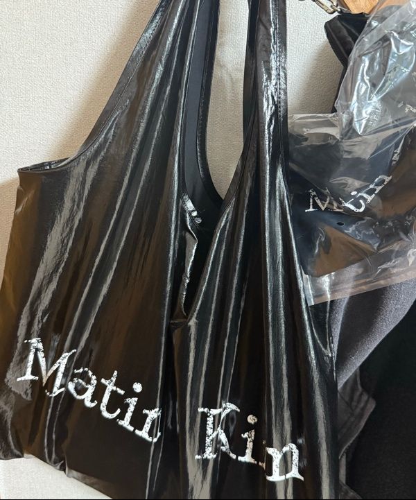 MUSINSA | MATIN KIM MATIN CRACKED LOGO GLOSSY ECOBAG IN