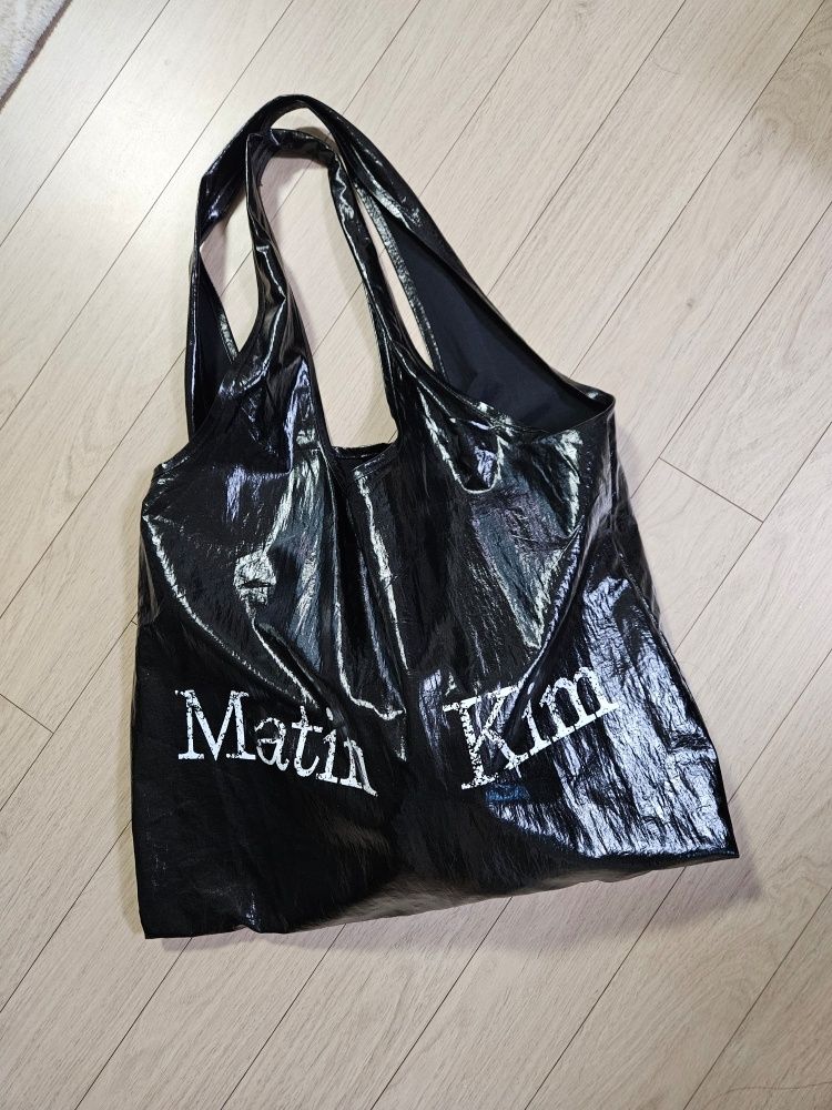 MUSINSA | MATIN KIM MATIN CRACKED LOGO GLOSSY ECOBAG IN
