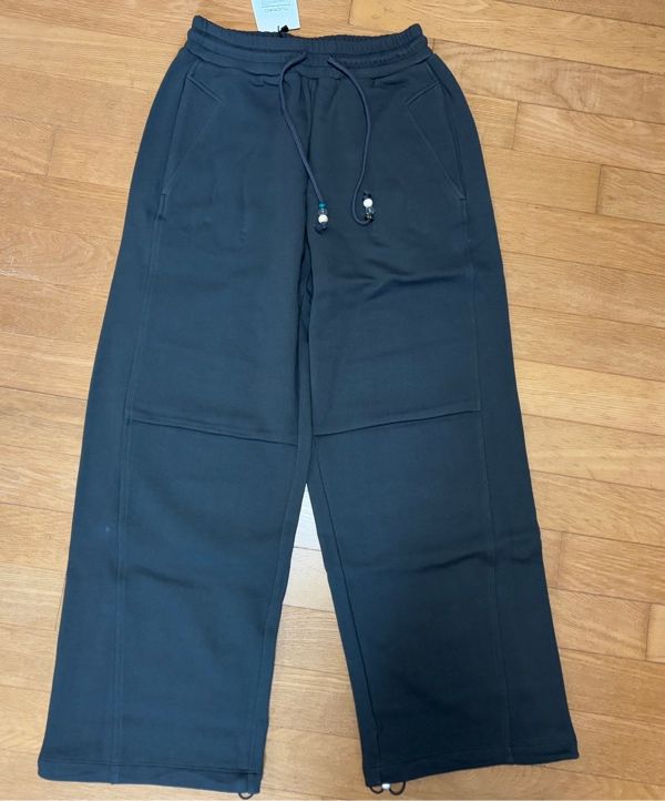 MUSINSA | TUOMIO STRING CHARM SWEATPANTS [BLACK]