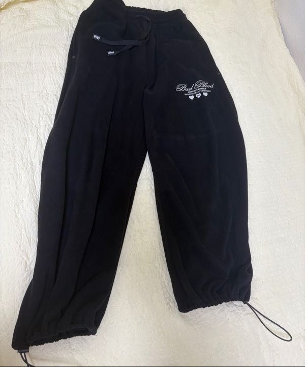 MUSINSA | BADBLOOD Classic Logo 2 Way Curved Jogger Trousers