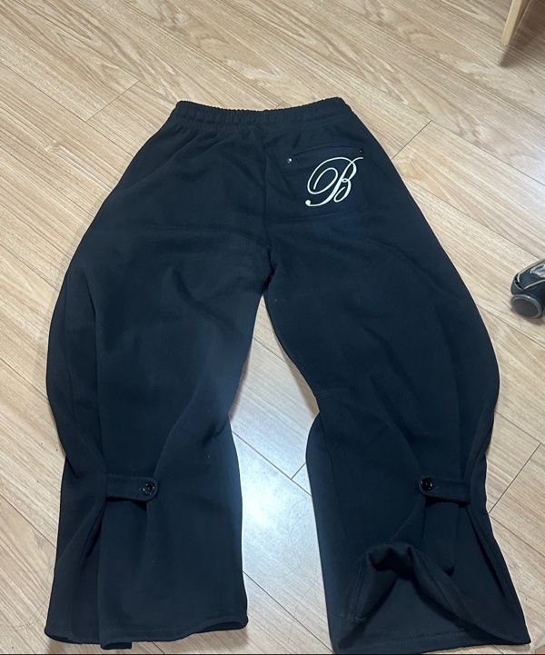 MUSINSA | BADBLOOD Classic Logo 2 Way Curved Jogger Trousers