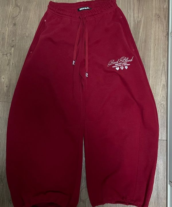MUSINSA | BADBLOOD Classic Logo 2 Way Curved Jogger Trousers