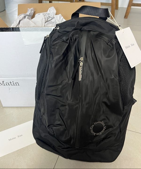 MUSINSA | MATIN KIM EXPLORER ZIPPER BACK PACK IN BLACK
