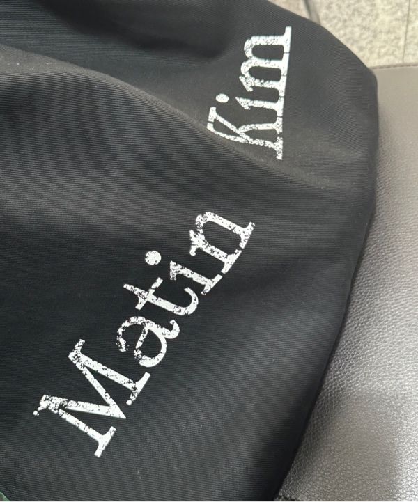 MUSINSA公式 | MATIN KIM MATIN CRACKED LOGO ECOBAG IN BLACK