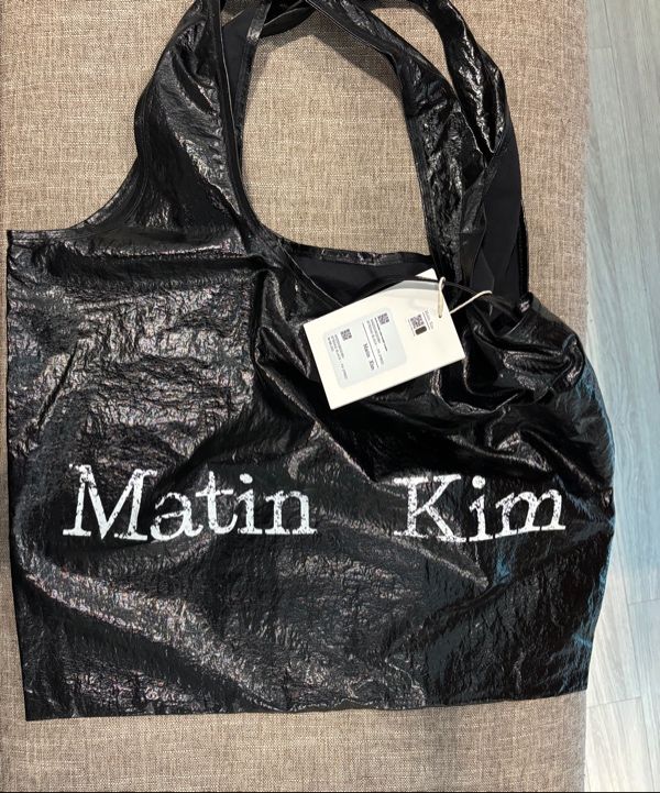 MUSINSA | MATIN KIM MATIN CRACKED LOGO ECOBAG IN BLACK
