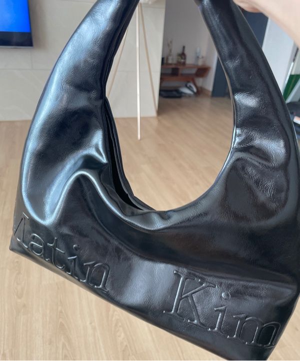 【MATIN KIM】EMBOSSED LOGO LEATHER MINI TOTE BAG EMBOSSED LOGO LEATHER MINI TOTE BAG IN IVORY – Matin Kim