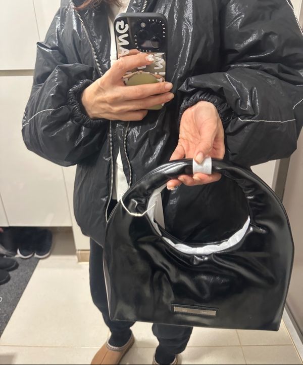 MUSINSA | MATIN KIM EMBOSSED LOGO LEATHER MINI TOTE BAG IN BLACK