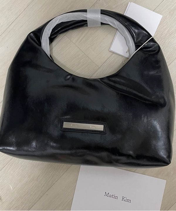 ★Matin Kim★EMBOSSED LOGO LEATHER MINI TOTE BAG MUSINSA | MATIN KIM EMBOSSED LOGO LEATHER MINI TOTE BAG IN BLACK