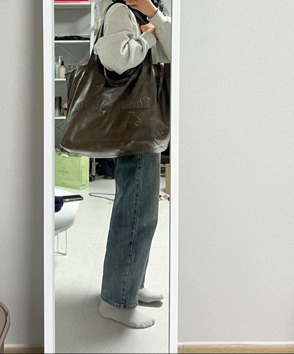★MATIN KIM★EMBOSSED LOGO LEATHER SHOULDER BAG MUSINSA | MATIN KIM EMBOSSED LOGO LEATHER SHOULDER BAG IN BLACK