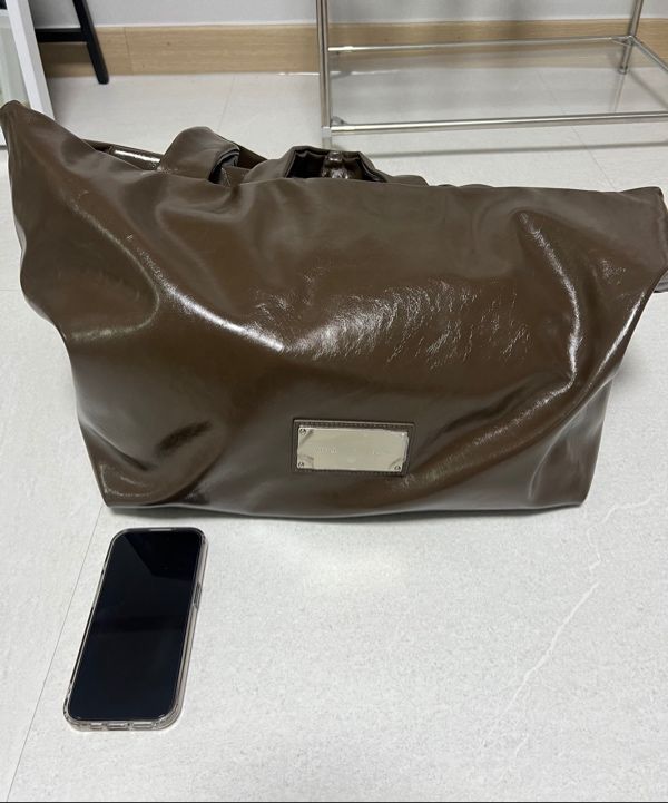 ★MATIN KIM ★EMBOSSED LOGO LEATHER MAXI BAG MUSINSA | MATIN KIM EMBOSSED LOGO LEATHER MAXI BAG IN BLACK