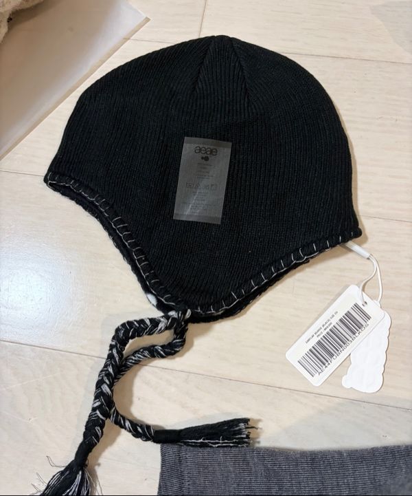 MUSINSA | AEAE EARFLAP BEANIE [BLACK]