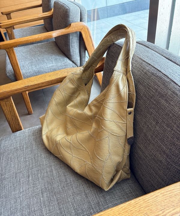 MUSINSA | SAND MUSEUM CACTUS HOBO BAG [Butter Yellow]