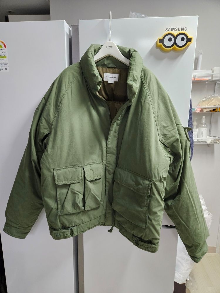 MUSINSA | thisisneverthat Multi Pocket Down Jacket Green