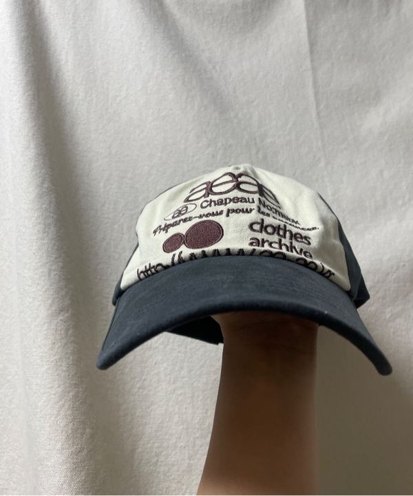 MUSINSA | AEAE WEB LOGO 5 PANNEL BALL CAP [DARK BROWN/BLACK]