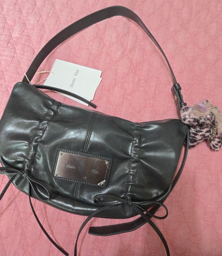 MUSINSA | MATIN KIM HALF SHIRRING RIBBON ROUND BAG IN CHARCOAL