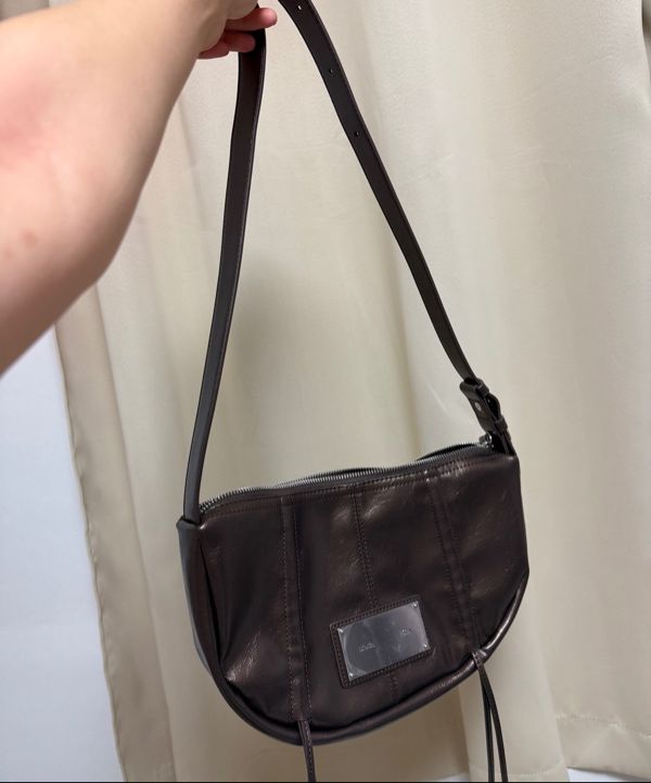 MUSINSA | MATIN KIM HALF SHIRRING RIBBON ROUND BAG IN BRONZE