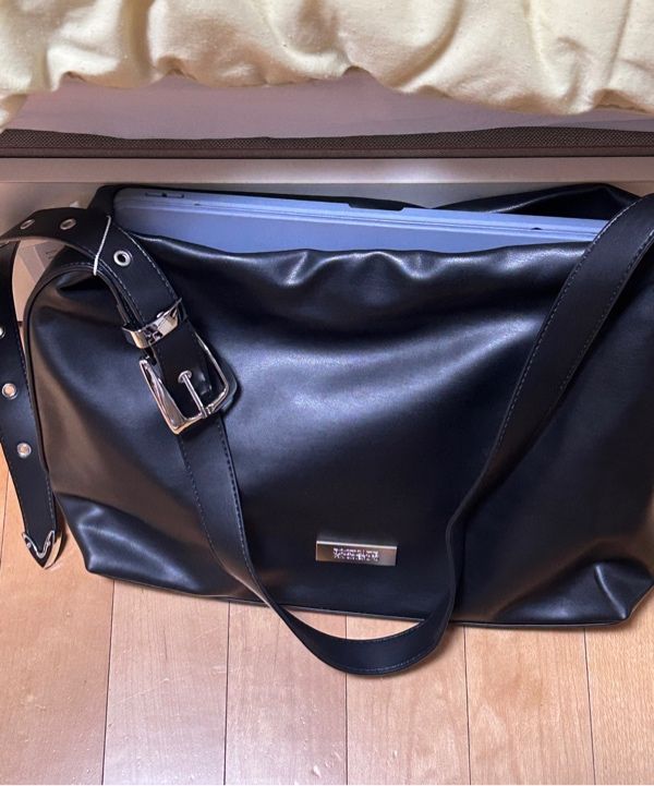 MUSINSA | ROCKCAKE Punching Belt Strap Shoulder Bag - Brown