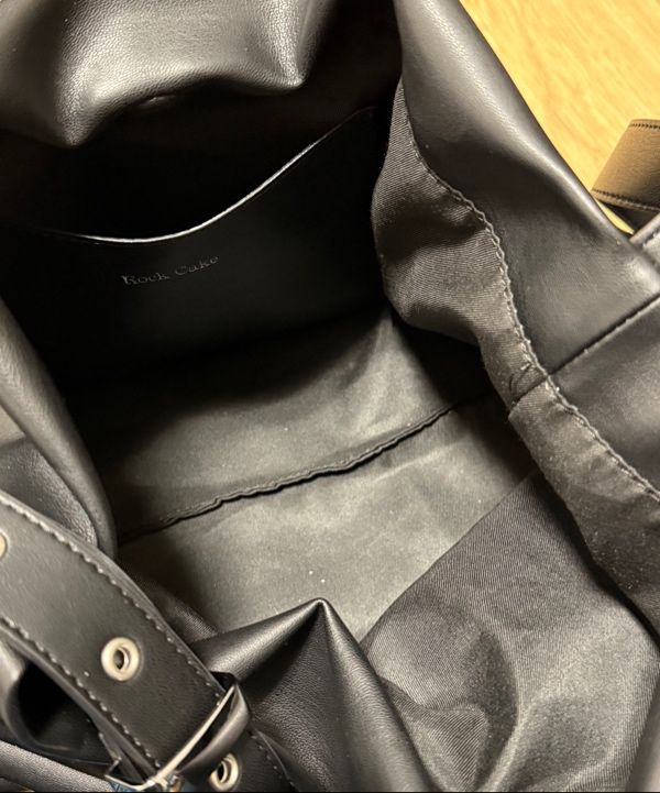 [ROCKCAKE] Punching Belt Strap Shoulder Bag /追跡付 MUSINSA | ROCKCAKE Punching Belt Strap Shoulder Bag - Black
