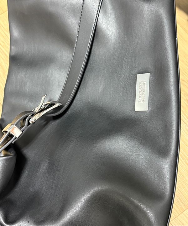 [ROCKCAKE] Punching Belt Strap Shoulder Bag /追跡付 MUSINSA | ROCKCAKE Punching Belt Strap Shoulder Bag - Black