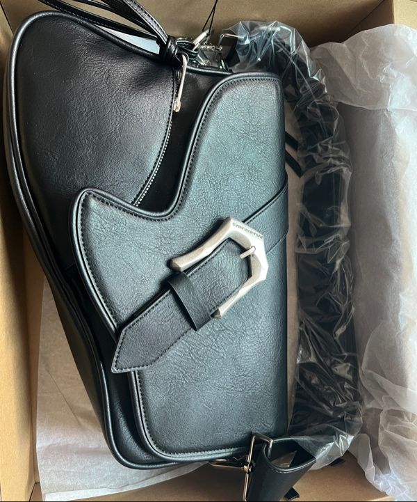 MUSINSA | IUGAMAKARAS Bumpy Buckle Holster Bag
