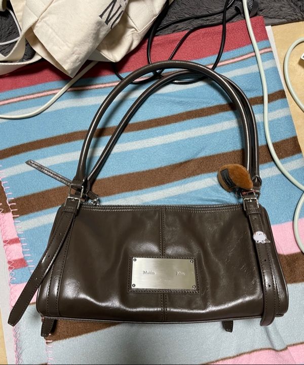 MUSINSA公式 | MATIN KIM BUCKLE STRAP SHOULDER BAG IN BROWN