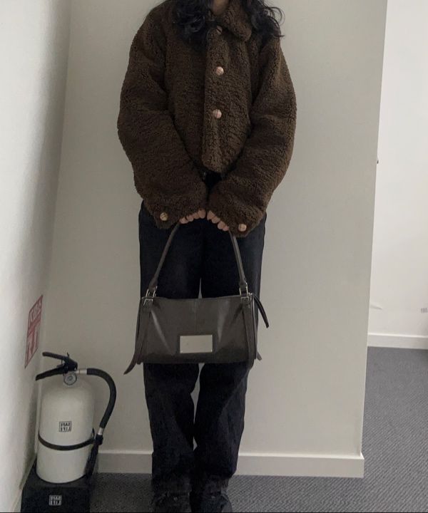 MUSINSA | MATIN KIM BUCKLE STRAP SHOULDER BAG IN BROWN