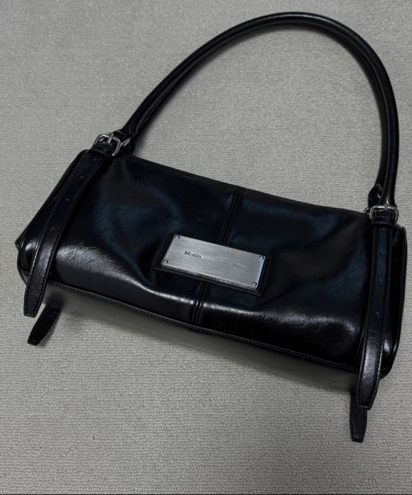 無料配送 ★Matin Kim★ BUCKLE STRAP SHOULDER BAG MUSINSA | MATIN KIM BUCKLE STRAP SHOULDER BAG IN BLACK