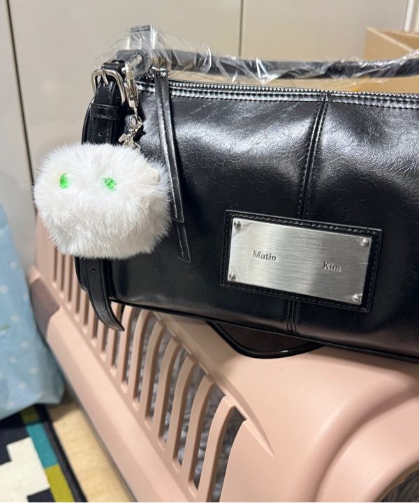 MUSINSA | MATIN KIM BUCKLE STRAP SHOULDER BAG IN BLACK