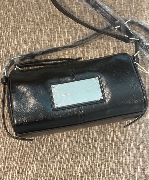 MUSINSA | MATIN KIM BUCKLE STRAP TWO WAY MINI BAG IN BLACK