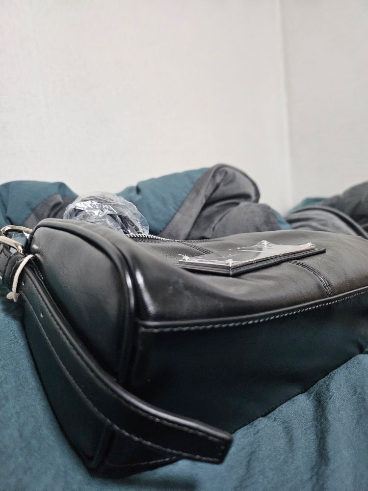 MUSINSA | MATIN KIM BUCKLE STRAP TWO WAY MINI BAG IN BLACK