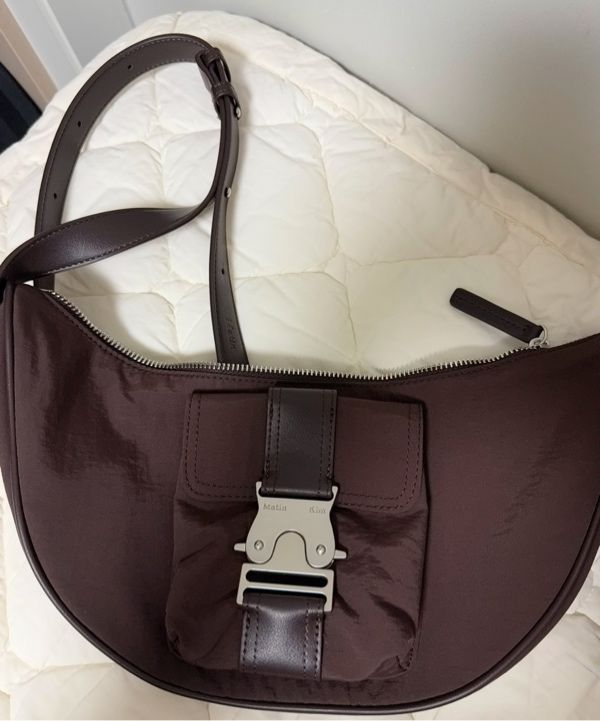 MUSINSA | MATIN KIM BUCKLE HOBO BAG IN BROWN
