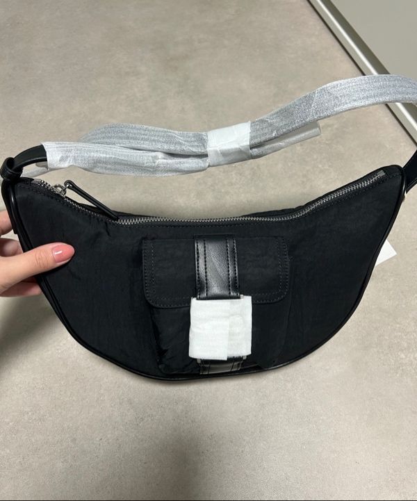 MUSINSA | MATIN KIM BUCKLE HOBO BAG IN BLACK