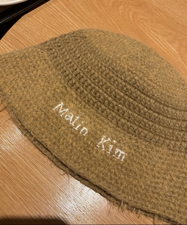 MUSINSA | MATIN KIM LOGO HAIRY KNIT BUCKET HAT IN BLACK