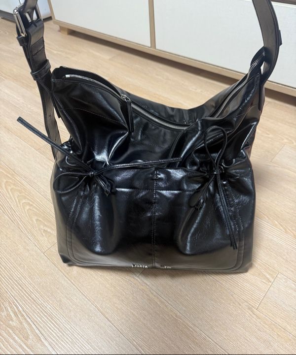 MUSINSA | MATIN KIM POCKET SHIRRING RIBBON BIG BAG IN BLACK