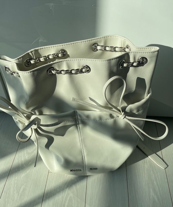 MUSINSA | MATIN KIM DRAW STRING RIBBON BACK PACK IN IVORY