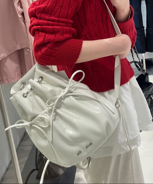 MUSINSA | MATIN KIM DRAW STRING RIBBON BACK PACK IN IVORY