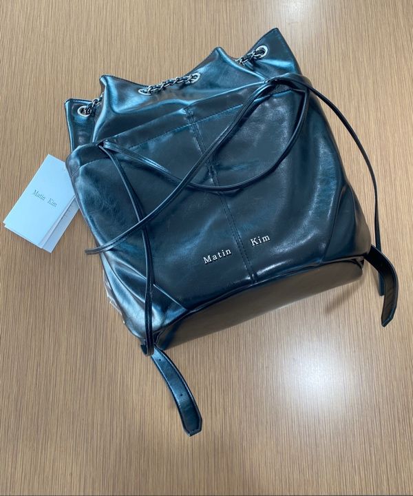 MUSINSA | MATIN KIM DRAW STRING RIBBON BACK PACK IN BLACK