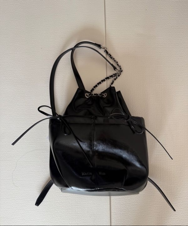 MUSINSA | MATIN KIM DRAW STRING RIBBON BACK PACK IN BLACK MUSINSA | MATIN KIM DRAW STRING RIBBON BACK PACK IN BLACK
