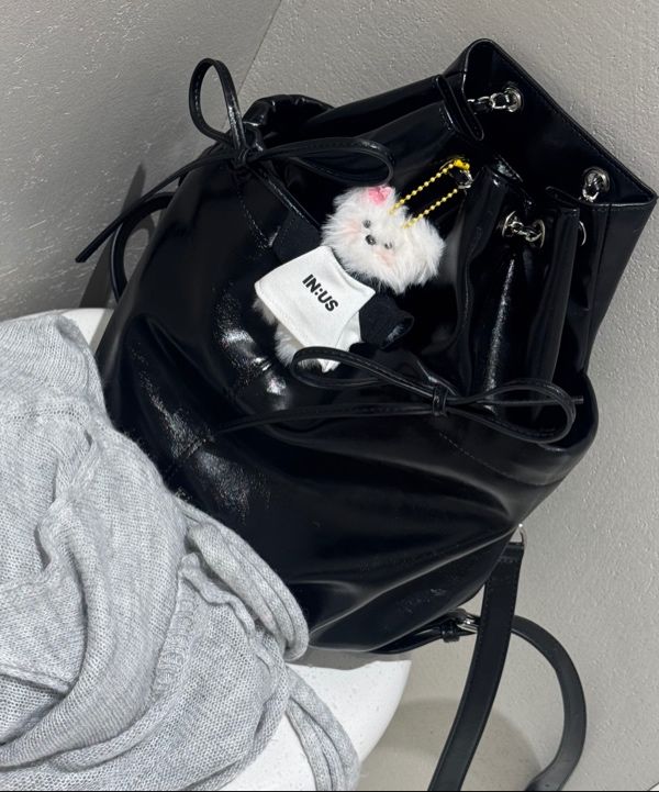 MUSINSA | MATIN KIM DRAW STRING RIBBON BACK PACK IN BLACK