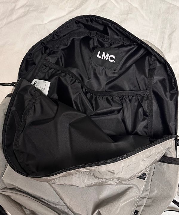 MUSINSA | LMC OVAL GLOBE BACKPACK gray